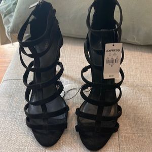Gorgeous Black heels Zipper back by Express. Size 10